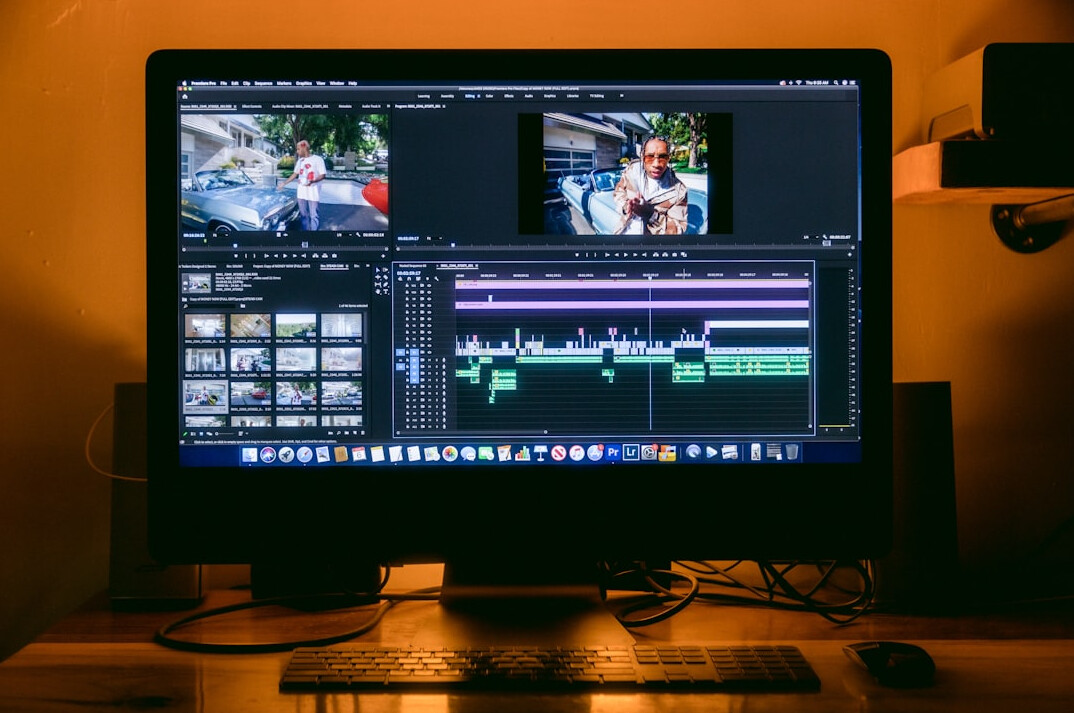 video editor working on computer