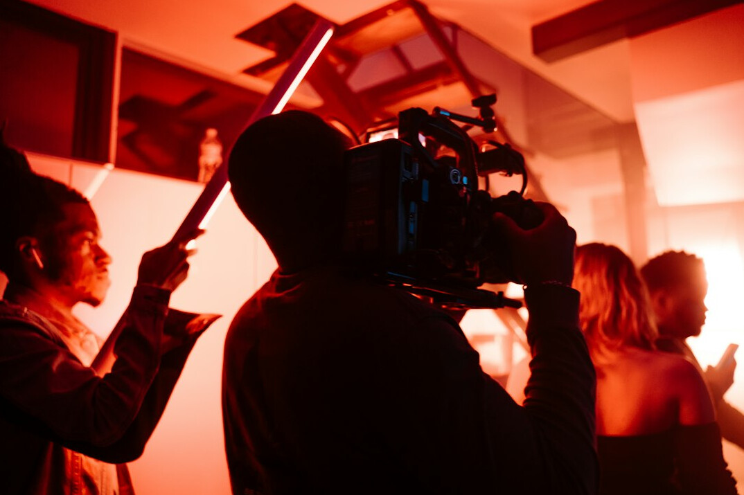 cinematographer adjusting lights